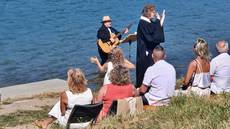 Tauffest am Badestrand in Brennet